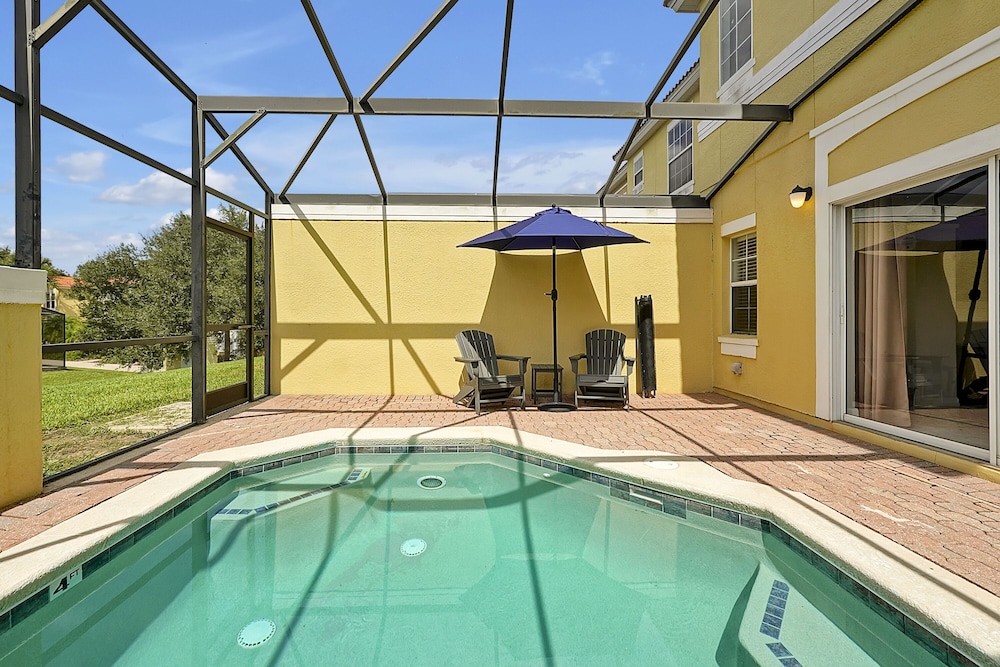 Vacation Townhomes by IDILIQ at Encantada Resort — Swimming pool in Kissimmee, Florida