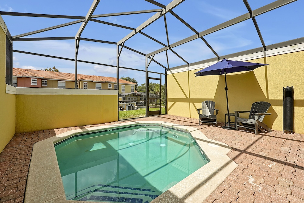 Vacation Townhomes by IDILIQ at Encantada Resort — Swimming pool in Kissimmee, Florida