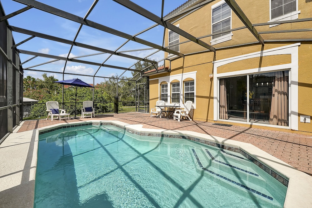Vacation Townhomes by IDILIQ at Encantada Resort — Swimming pool in Kissimmee, Florida