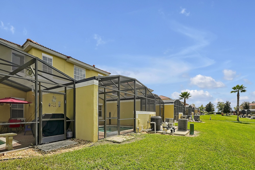 Vacation Townhomes by IDILIQ at Encantada Resort — Swimming pool in Kissimmee, Florida