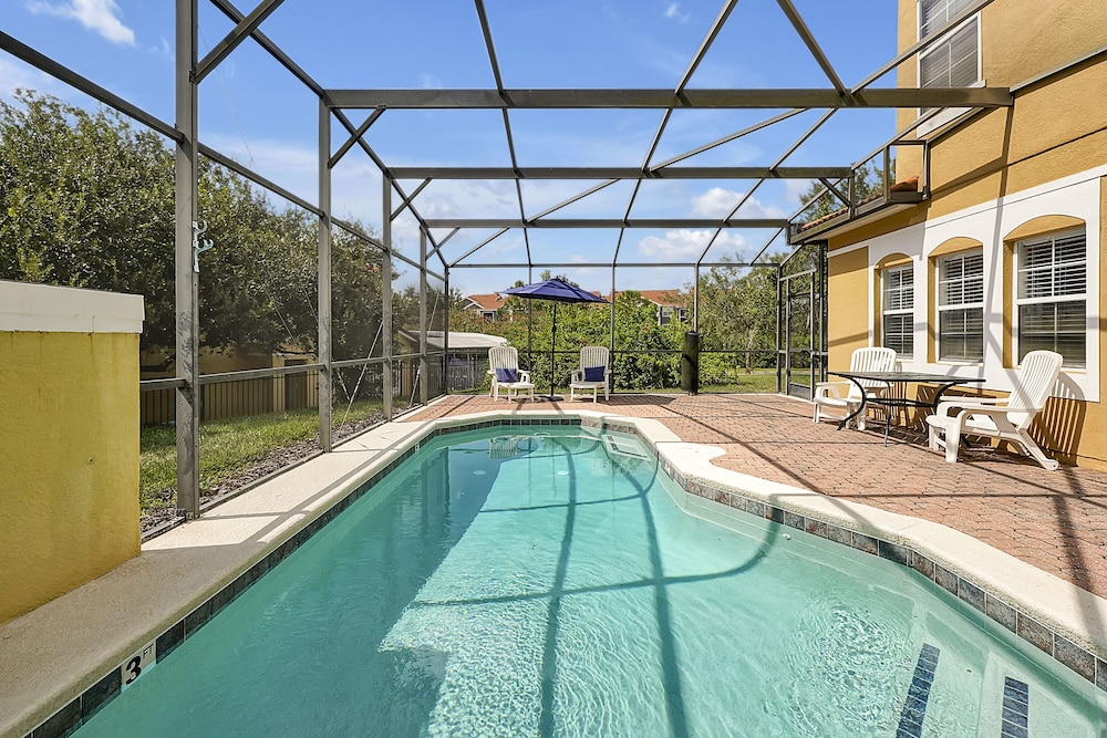 Vacation Townhomes by IDILIQ at Encantada Resort — Swimming pool in Kissimmee, Florida