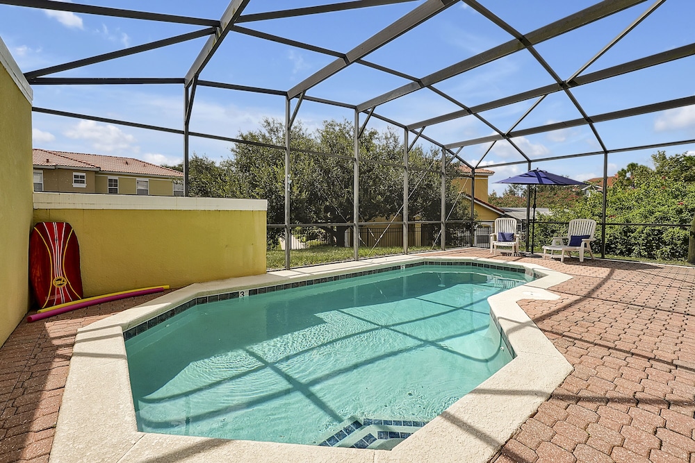 Vacation Townhomes by IDILIQ at Encantada Resort — Swimming pool in Kissimmee, Florida