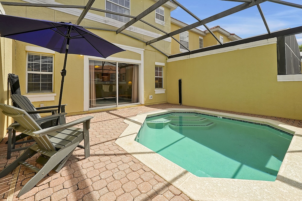 Vacation Townhomes by IDILIQ at Encantada Resort — Swimming pool in Kissimmee, Florida