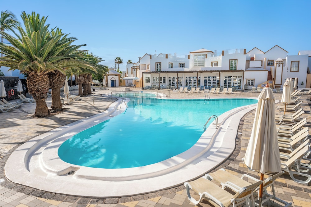 Apartamentos LIVVO Morromar — Swimming pool in Puerto del Carmen, Canary Islands