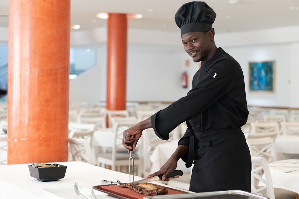 Aparthotel Tropicana — Restaurant & bars in Cala Millor, Balearic Islands