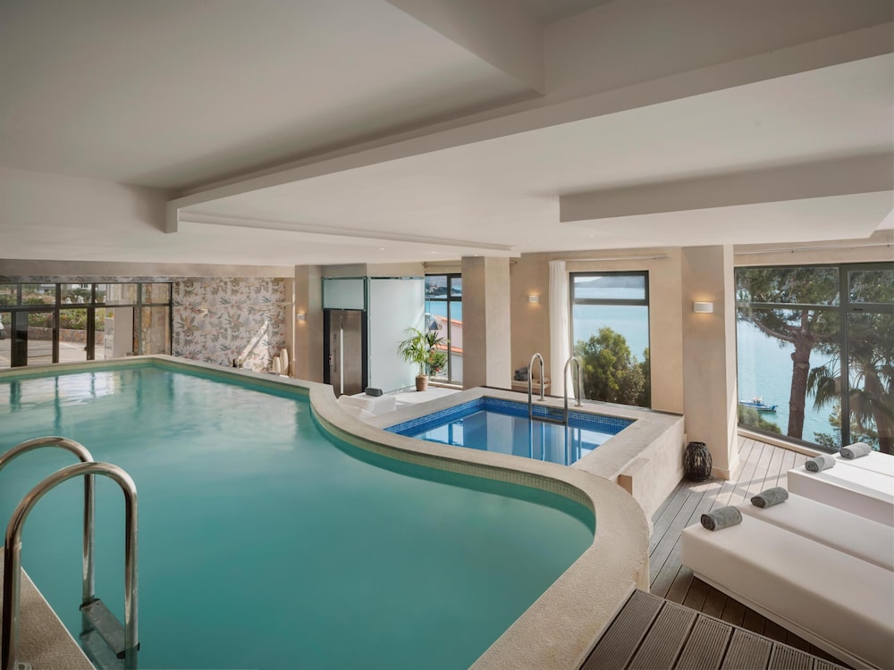 Domes Aulus Elounda Resort, Curio Collection by Hilton - All inclusive — Swimming pool in Elounda