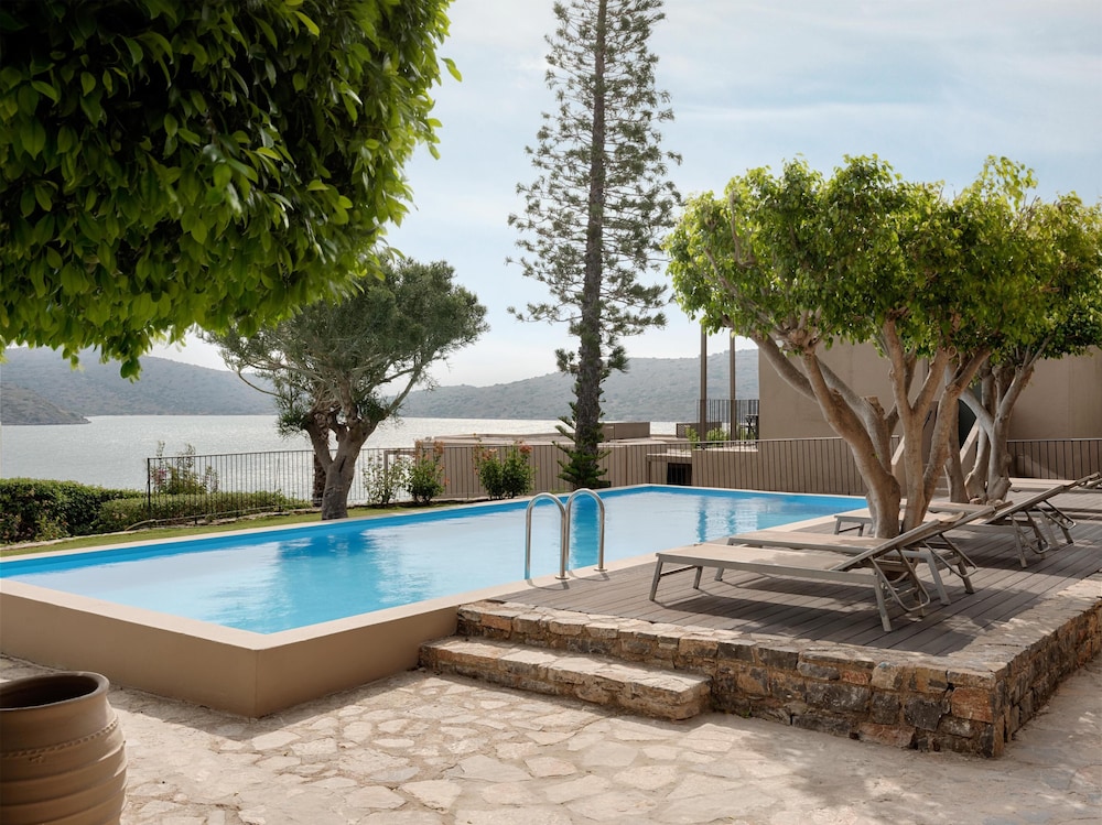 Domes Aulus Elounda Resort, Curio Collection by Hilton - All inclusive — Swimming pool in Elounda
