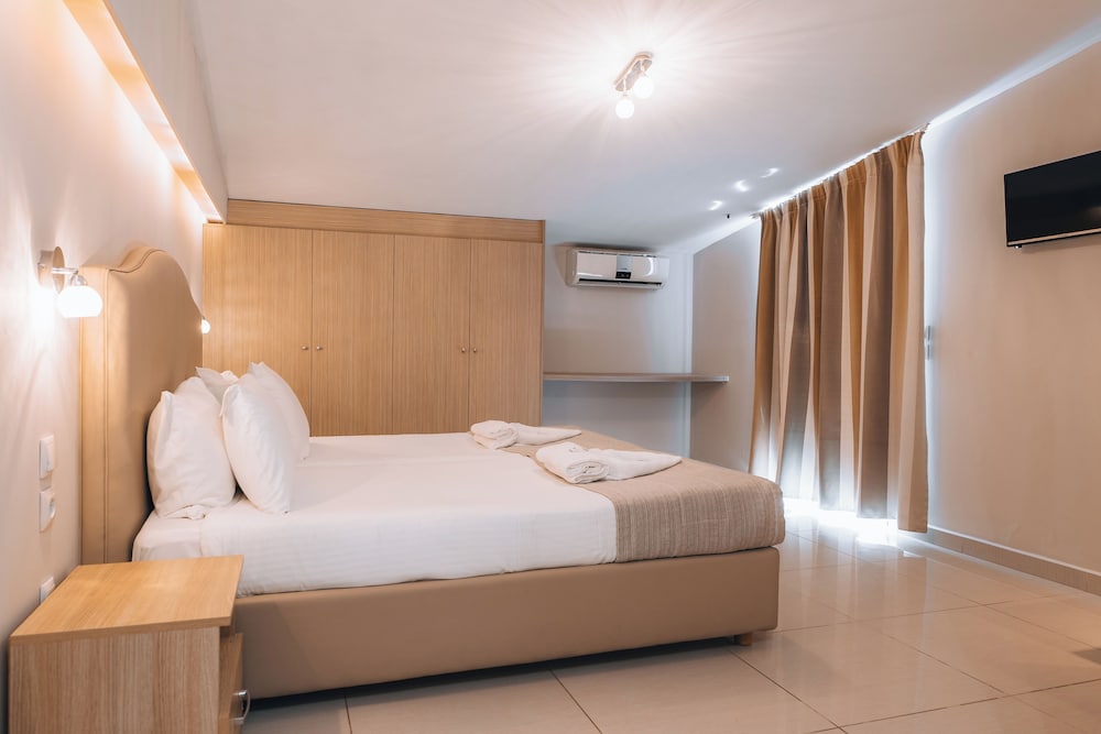 Porto Planos Beach Hotel — Hotel rooms in Tsilivi, Ionian Islands