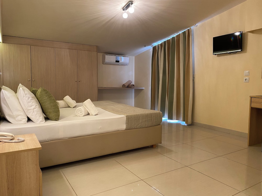 Porto Planos Beach Hotel — Hotel rooms in Tsilivi, Ionian Islands