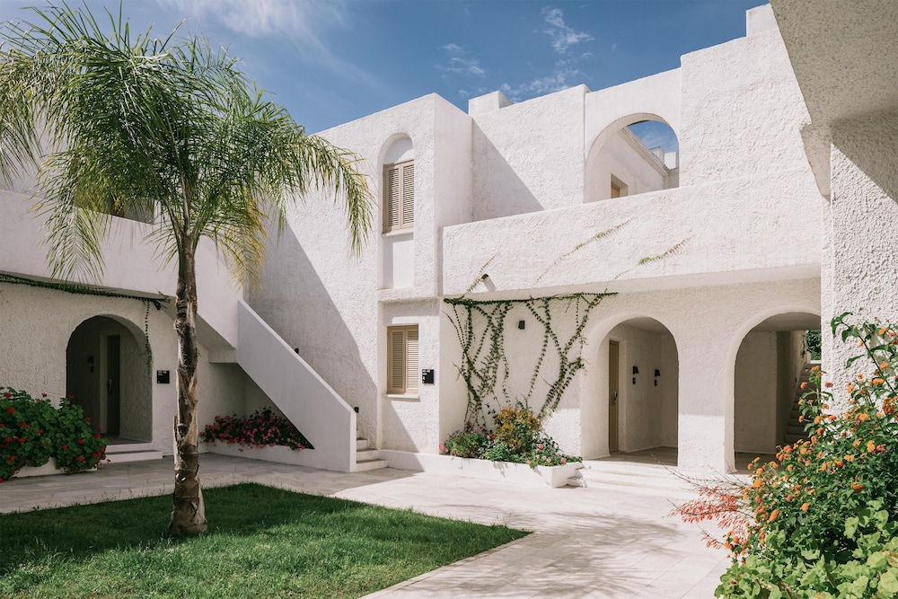 Mangia's Pollina Resort — Hotel building in Pollina, Sicily