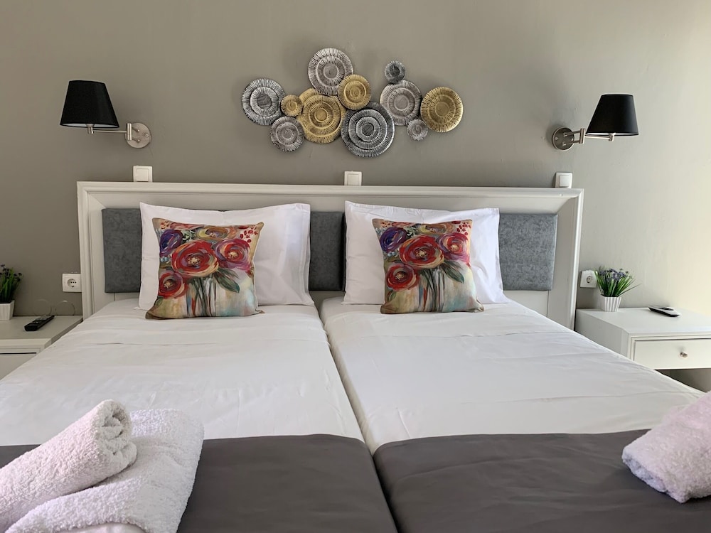Alkyonides Hotel — Hotel rooms in Kremasti, South Aegean