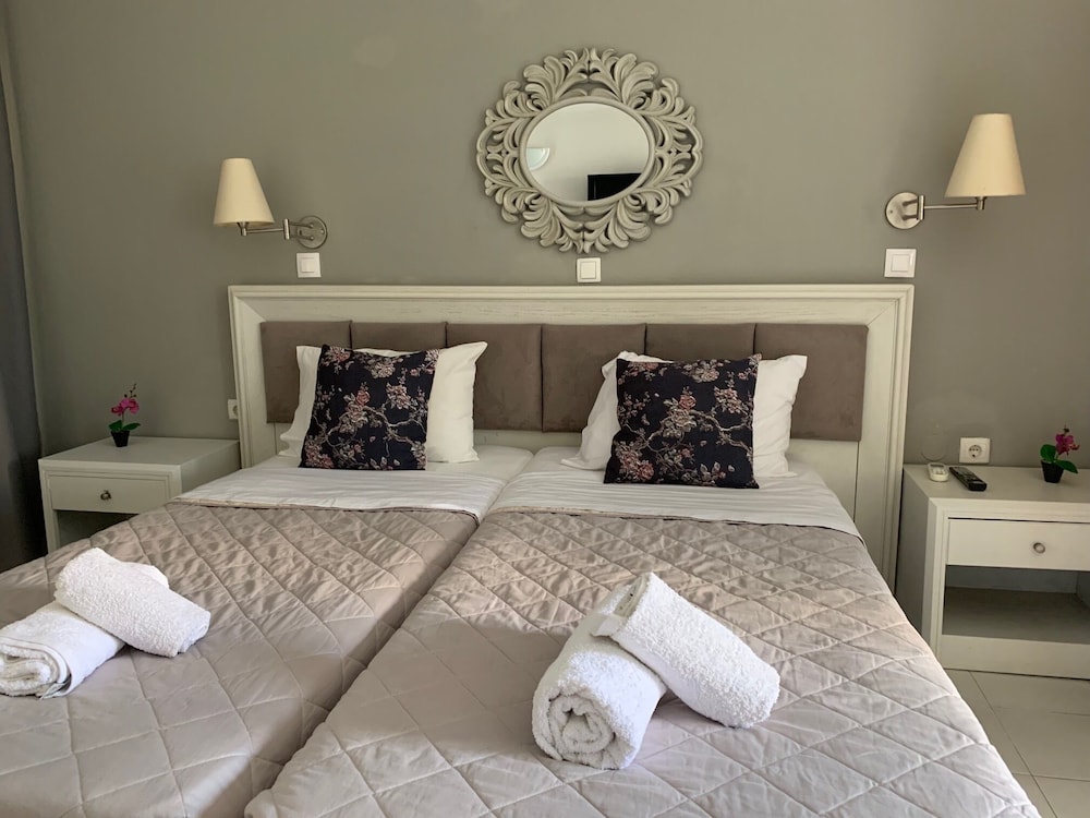 Alkyonides Hotel — Hotel rooms in Kremasti, South Aegean