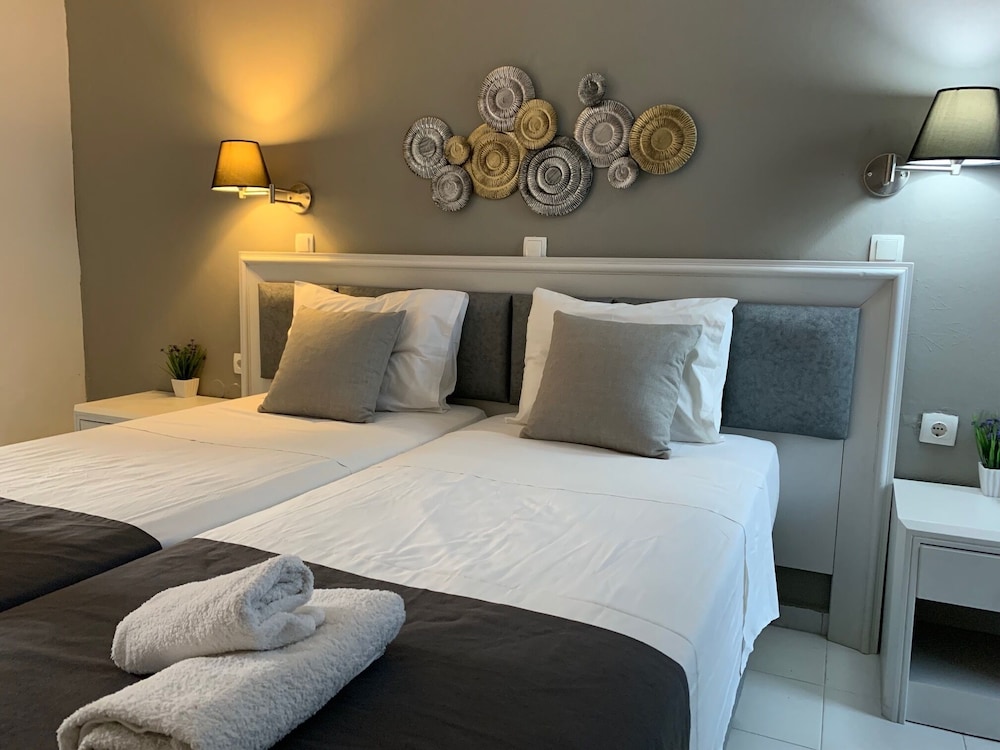 Alkyonides Hotel — Hotel rooms in Kremasti, South Aegean