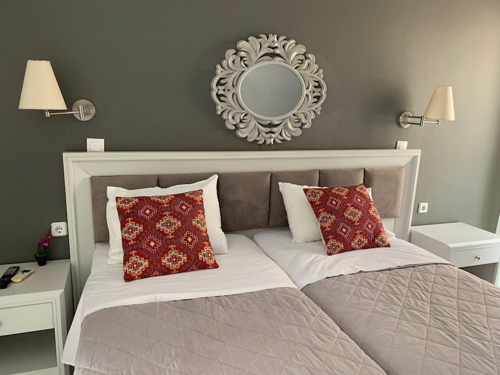 Alkyonides Hotel — Hotel rooms in Kremasti, South Aegean