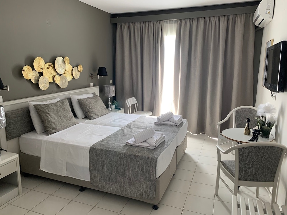 Alkyonides Hotel — Hotel rooms in Kremasti, South Aegean