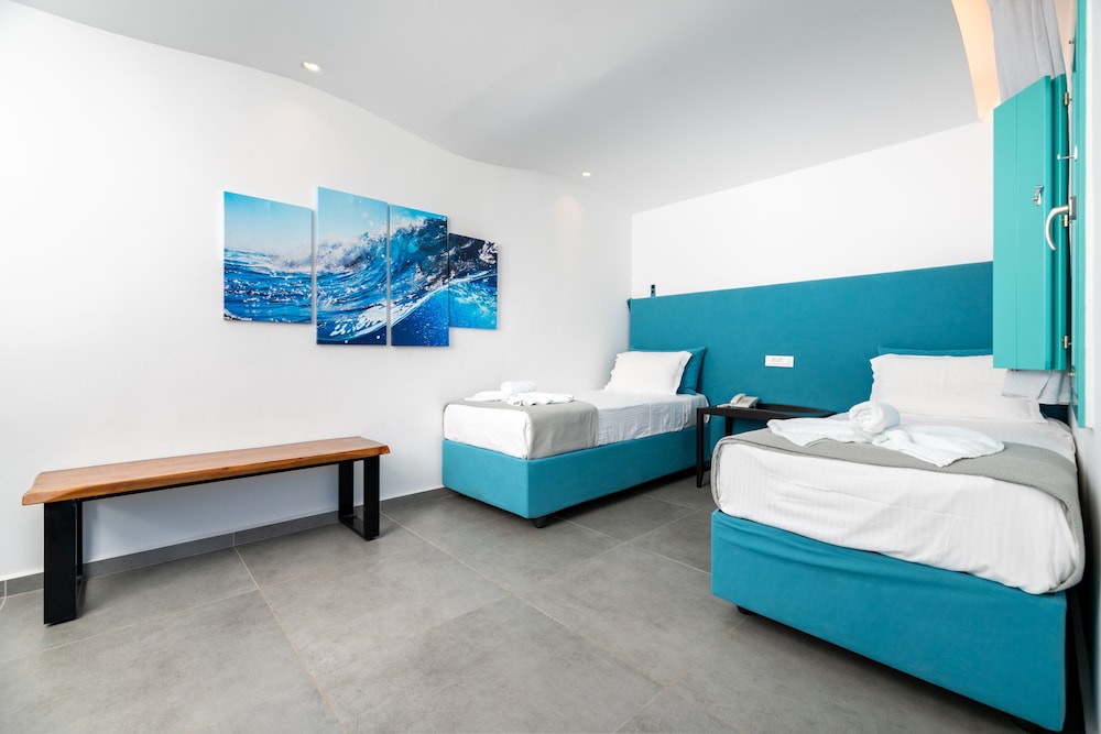Santa Irina Luxury Sunny Lofts — Hotel rooms in Aghios Georgios (Santorini), South Aegean