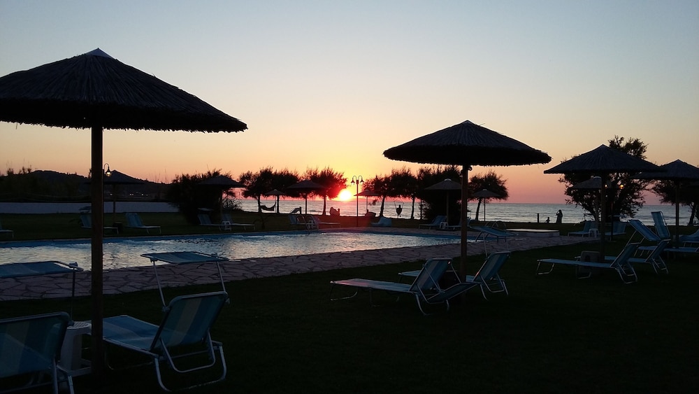S&C Kosmos Beach Resort — Beach in Roda, Ionian Islands