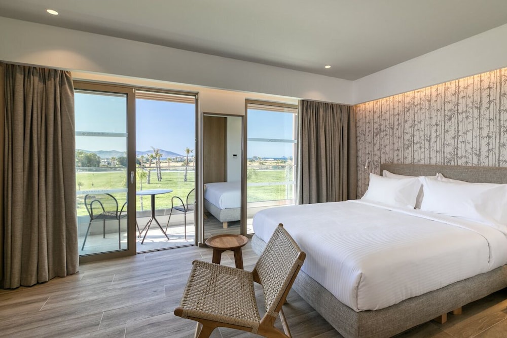 Utopia Blu — Hotel rooms in Tigaki, South Aegean