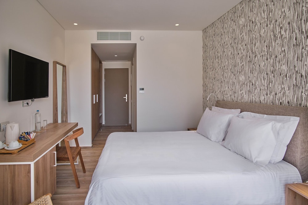 Utopia Blu — Hotel rooms in Tigaki, South Aegean