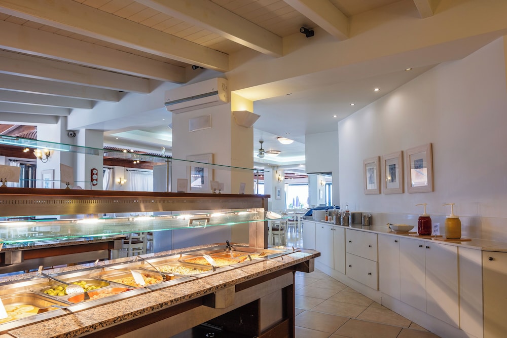 Koni Village Hotel — Restaurant & bars in Stalida