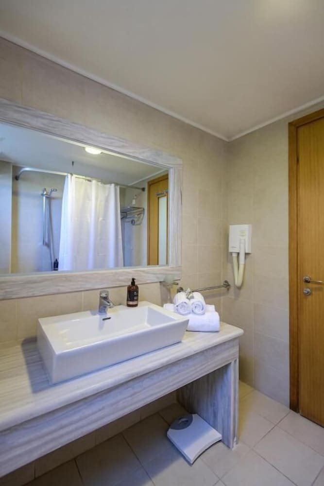 Natura Park Village Hotel & Spa — Hotel rooms in Psalidi, South Aegean