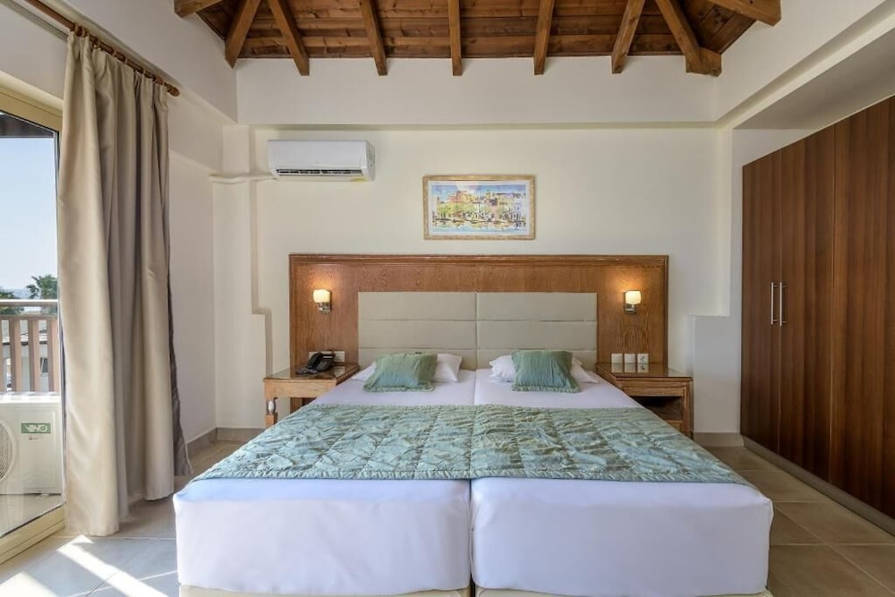 Natura Park Village Hotel & Spa — Hotel rooms in Psalidi, South Aegean