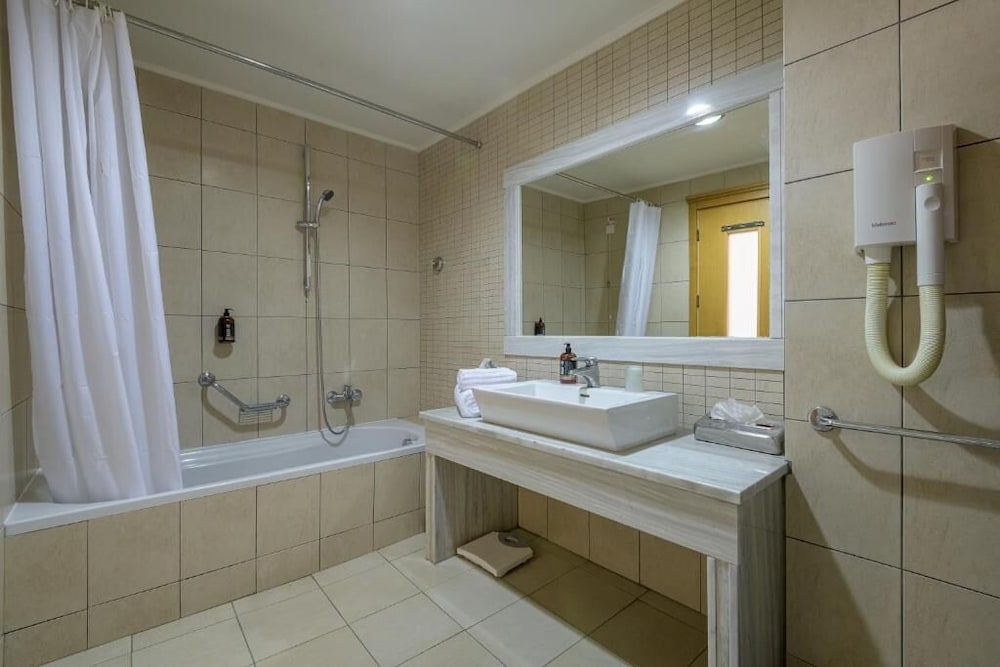 Natura Park Village Hotel & Spa — Hotel rooms in Psalidi, South Aegean