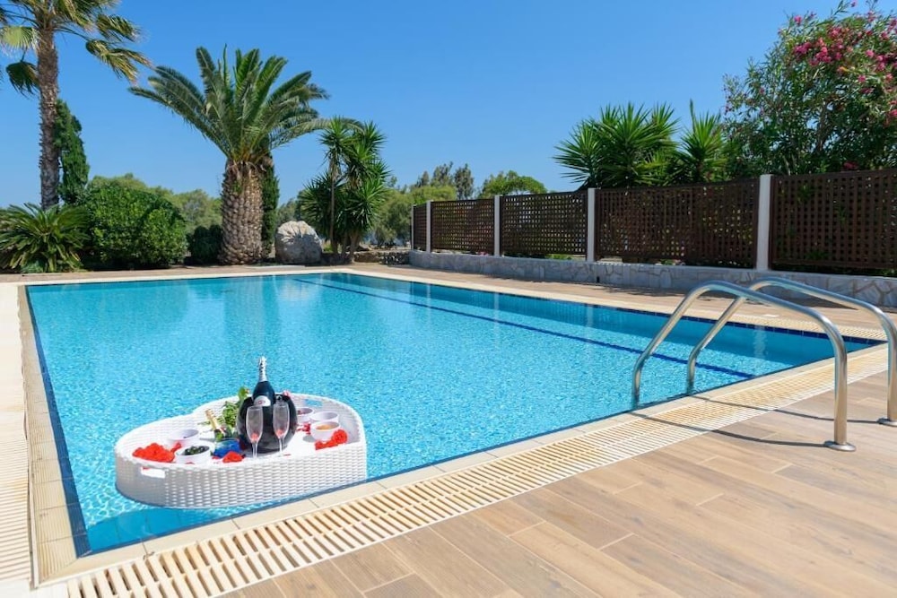 Natura Park Village Hotel & Spa — Swimming pool in Psalidi, South Aegean