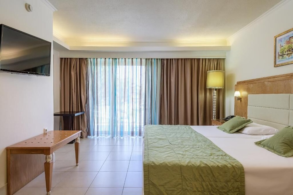 Natura Park Village Hotel & Spa — Hotel rooms in Psalidi, South Aegean