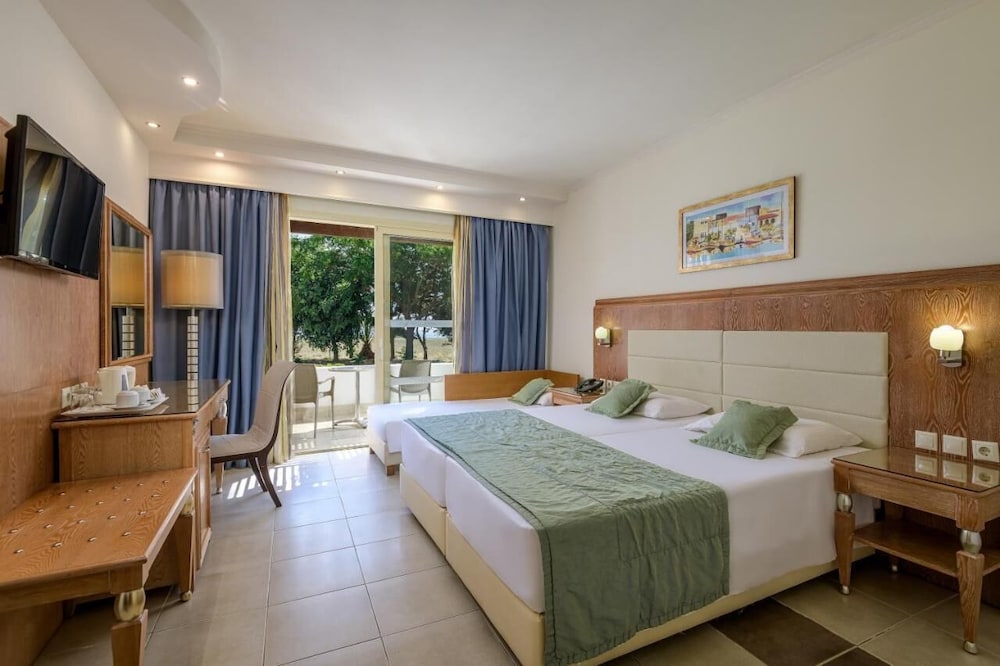 Natura Park Village Hotel & Spa — Hotel rooms in Psalidi, South Aegean