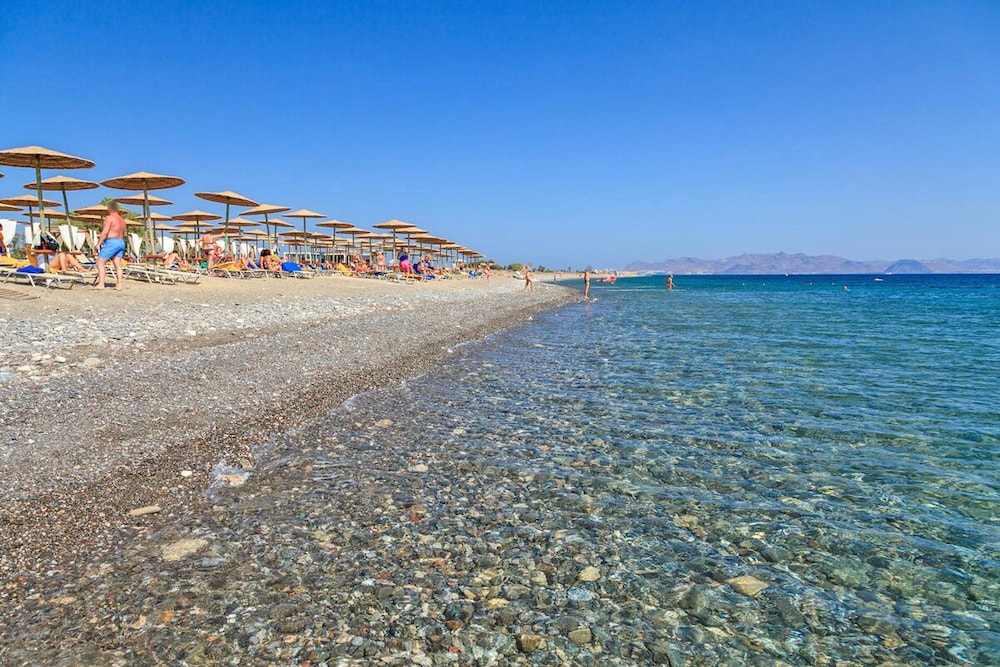 Natura Park Village Hotel & Spa — Beach in Psalidi, South Aegean