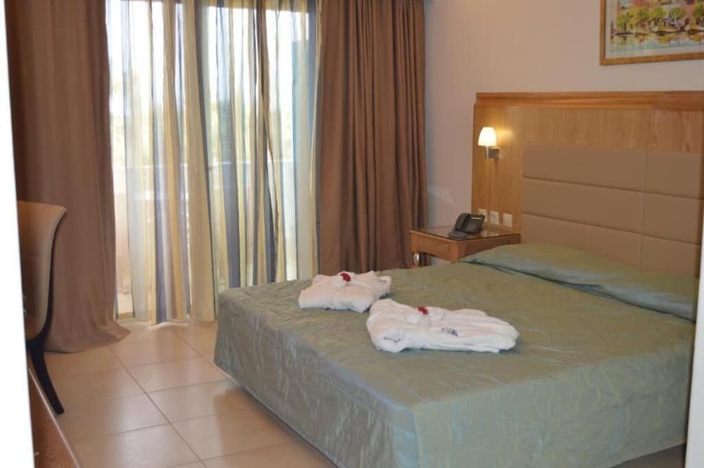 Natura Park Village Hotel & Spa — Hotel rooms in Psalidi, South Aegean