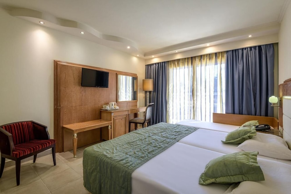 Natura Park Village Hotel & Spa — Hotel rooms in Psalidi, South Aegean