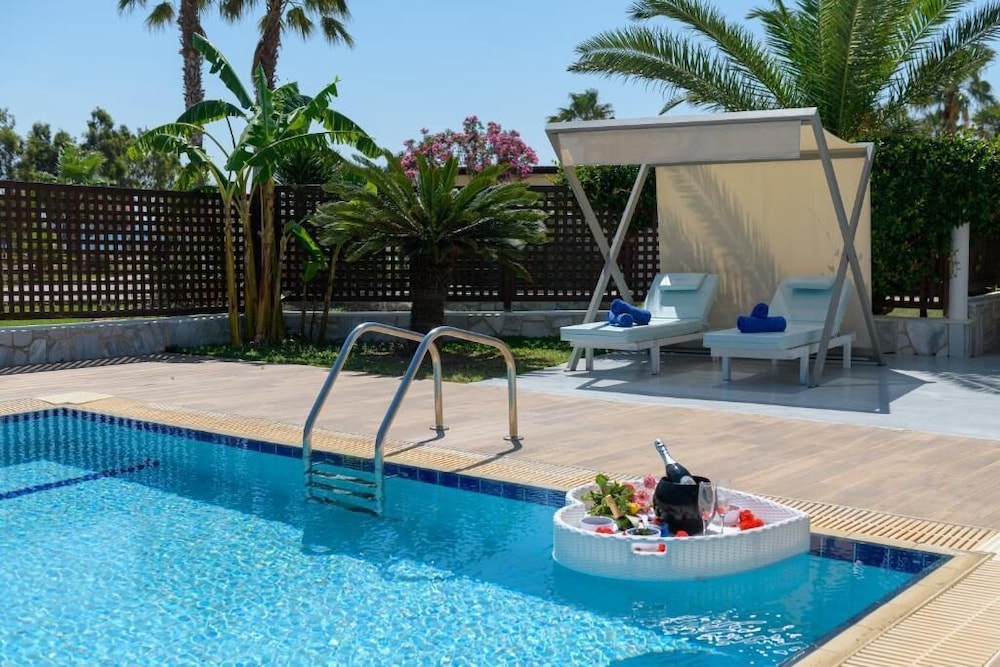 Natura Park Village Hotel & Spa — Swimming pool in Psalidi, South Aegean