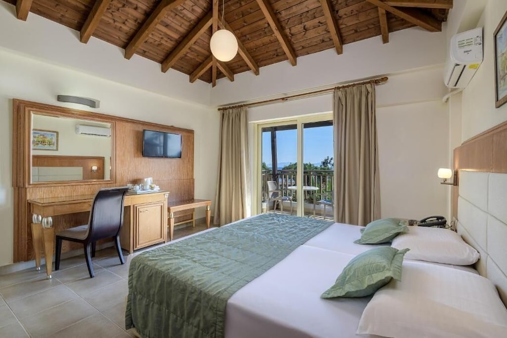 Natura Park Village Hotel & Spa — Hotel rooms in Psalidi, South Aegean