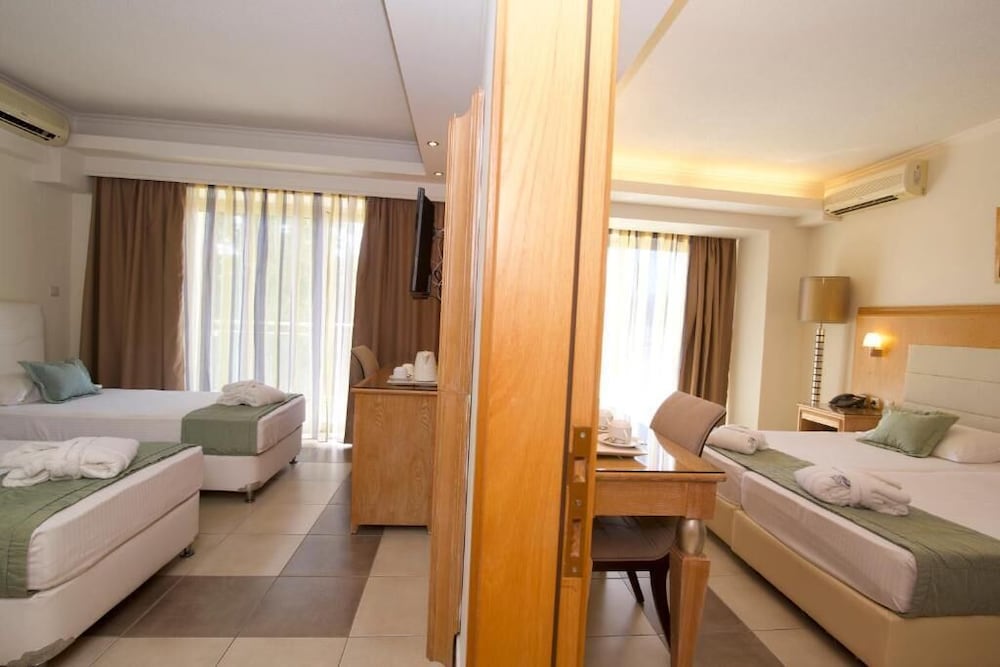 Natura Park Village Hotel & Spa — Hotel rooms in Psalidi, South Aegean