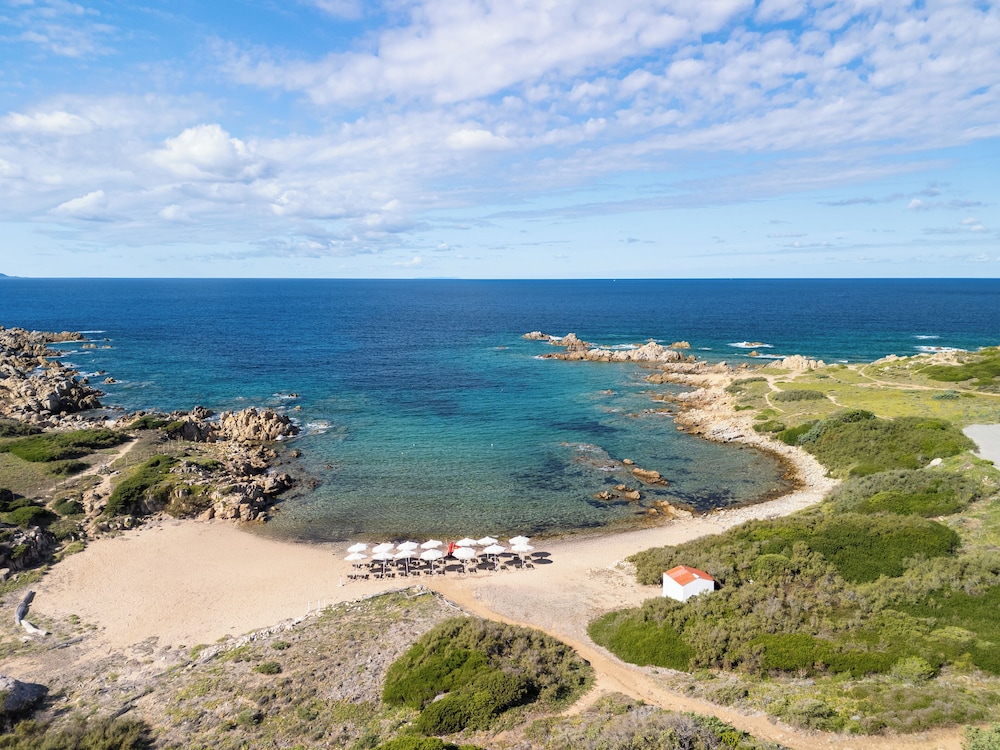 Mangia's Santa Teresa Sardinia, Curio Collection by Hilton — Beach in Capo Testa, Sardinia