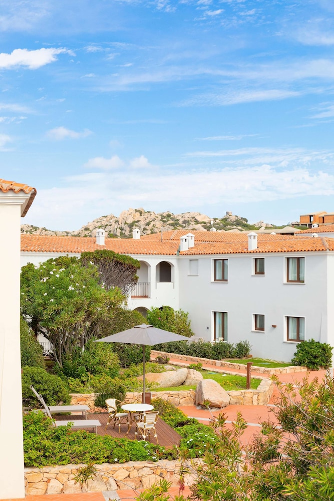 Mangia's Santa Teresa Sardinia, Curio Collection by Hilton — Hotel building in Capo Testa, Sardinia