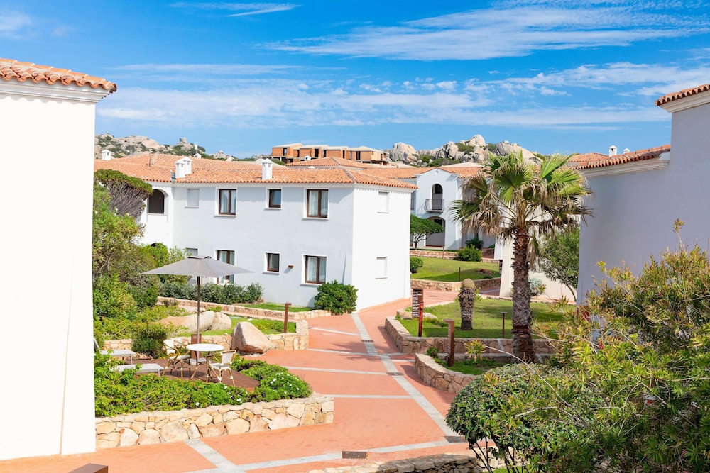 Mangia's Santa Teresa Sardinia, Curio Collection by Hilton — Hotel building in Capo Testa, Sardinia