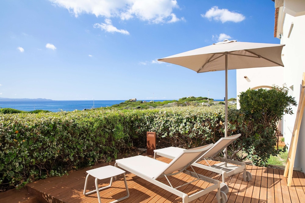 Mangia's Santa Teresa Sardinia, Curio Collection by Hilton — Beach in Capo Testa, Sardinia