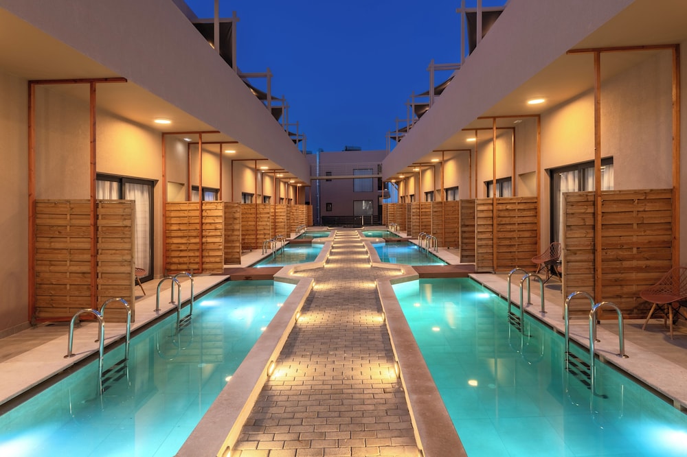 Golden Bee Lifestyle — Swimming pool in Stalida