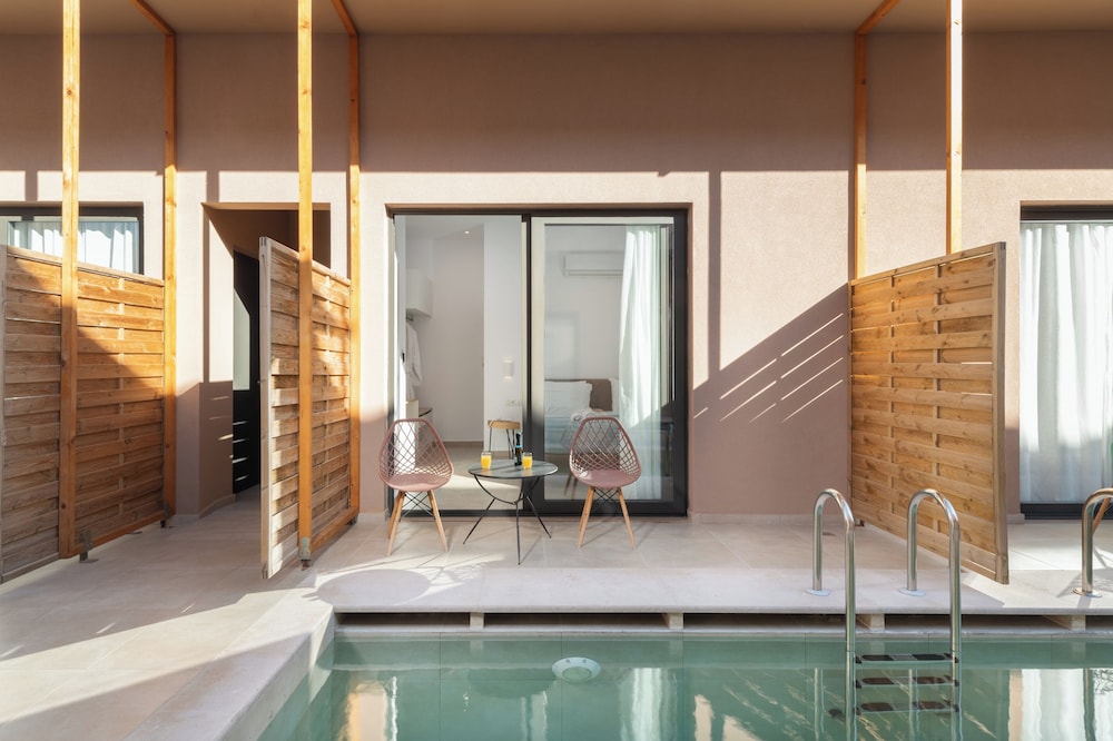 Golden Bee Lifestyle — Swimming pool in Stalida