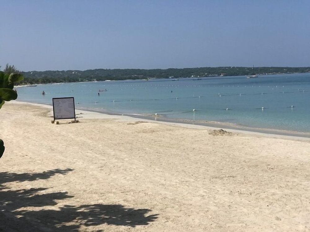 Firefly Beach Cottages and Suites — Beach in Negril