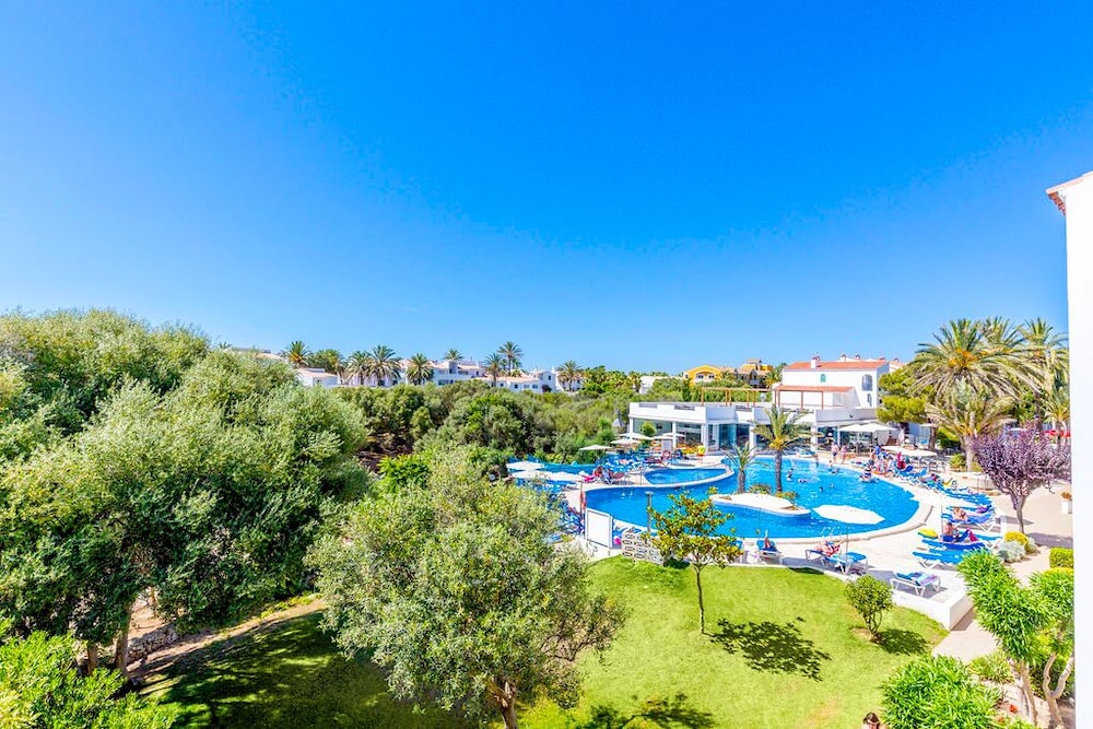 Vibra Caleta Playa Apartamentos — Swimming pool in Santandria, Balearic Islands