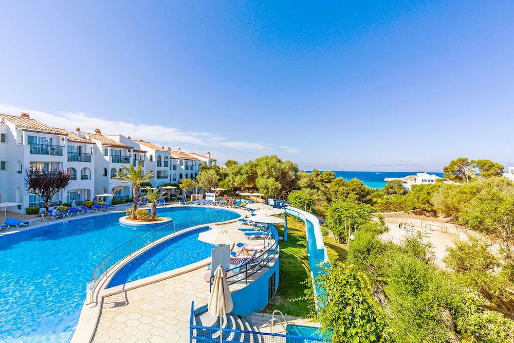 Vibra Caleta Playa Apartamentos — Swimming pool in Santandria, Balearic Islands