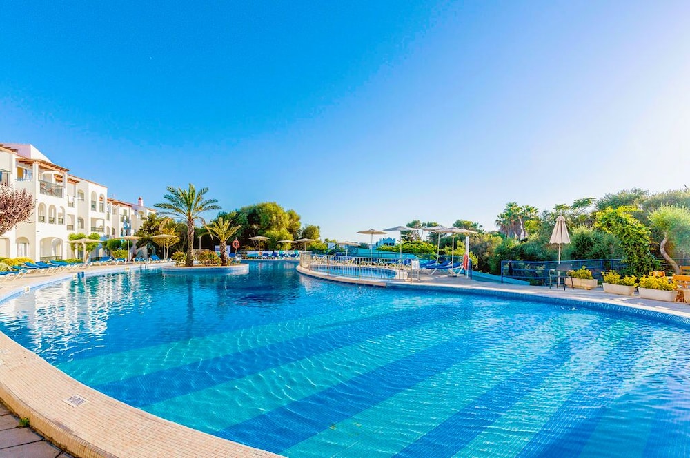 Vibra Caleta Playa Apartamentos — Swimming pool in Santandria, Balearic Islands
