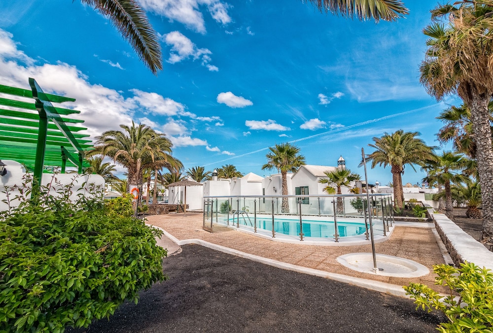 Apartamentos LIVVO Las Gaviotas — Swimming pool in Puerto del Carmen, Canary Islands