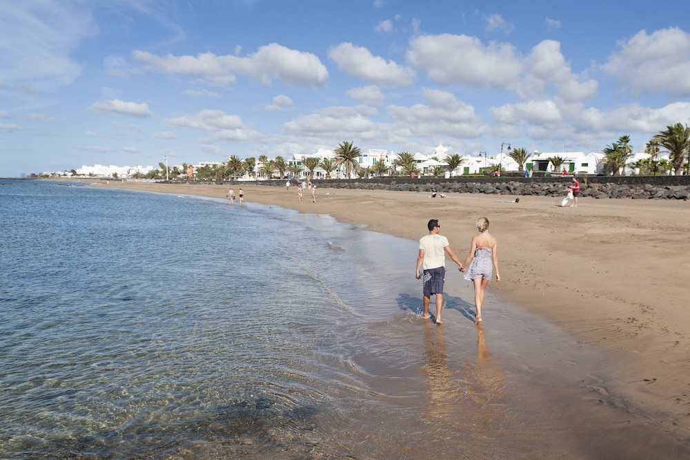 Apartamentos LIVVO Las Gaviotas — Beach in Puerto del Carmen, Canary Islands