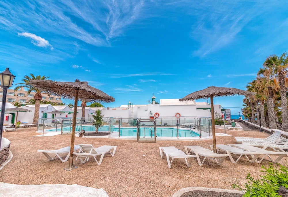 Apartamentos LIVVO Las Gaviotas — Swimming pool in Puerto del Carmen, Canary Islands