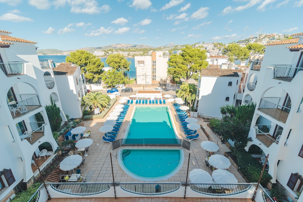 Flipflop Surfing Playa Apartments — Swimming pool in Santa Ponca, Balearic Islands